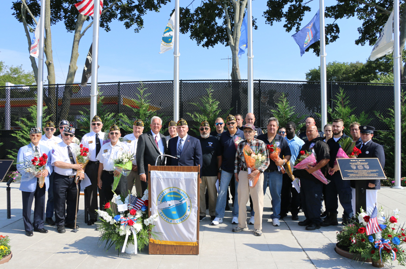 Mayor Allan M. Dorman (fifth from left) poses with John Kennedy (fourth from right), Suffolk County Comptroller, members of the Col. Francis S. Midura Veterans of Foreign Wars Post #12144, the Korean War Veterans Association, Central Long Island Chapter, local first responders and Islandia Village safety officers at the First Responders Memorial after a special dedication ceremony on September 11. The village remembered five local first responders who died during the 9/11 attacks.