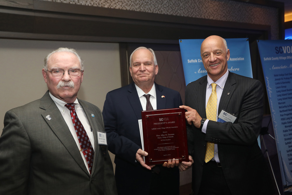 Allan M. Dorman, Mayor, Village of Islandia and Immediate Past President, Suffolk County Village Officials Association (SCVOA), received the President’s Award at SCVOA's Legislative Dinner and Awards Night, which took place on April 11 at the Hotel Indigo East End in Riverhead. He is joined by Ralph A. Scordino (left), Mayor, Village of Babylon and Past President, SCVOA, and Hon. Paul Tonna, Executive Director, SCVOA.