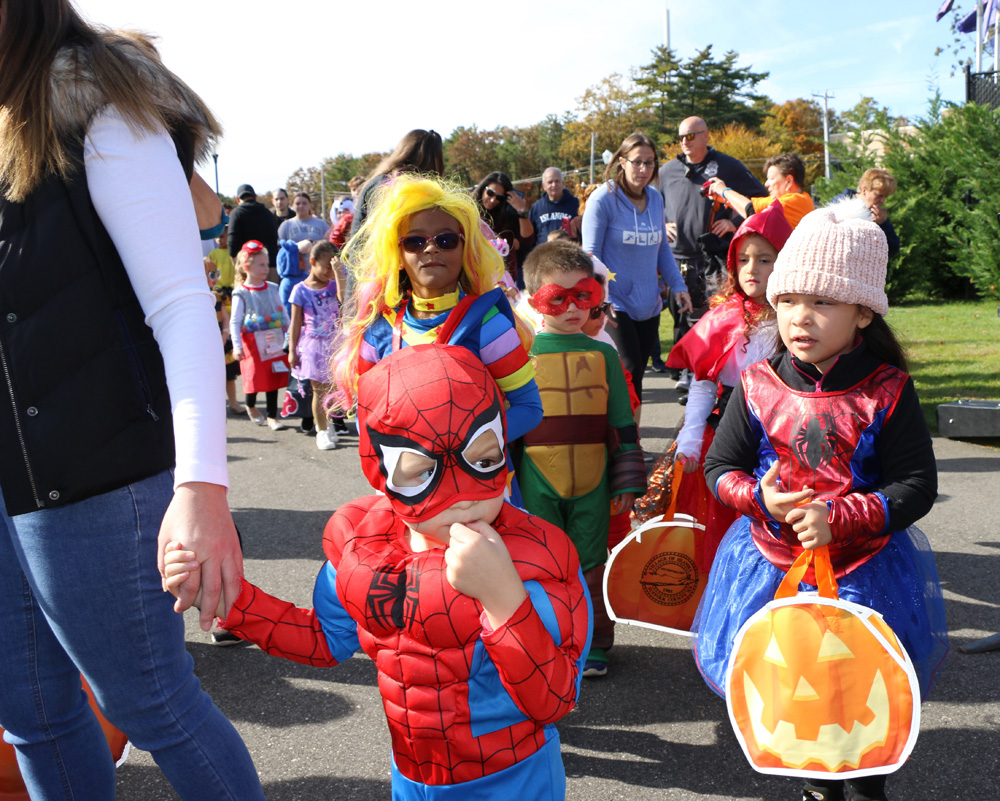 Children take part in the costume parade during the Village of Islandia’s Pumpkin Fest on October 26.
