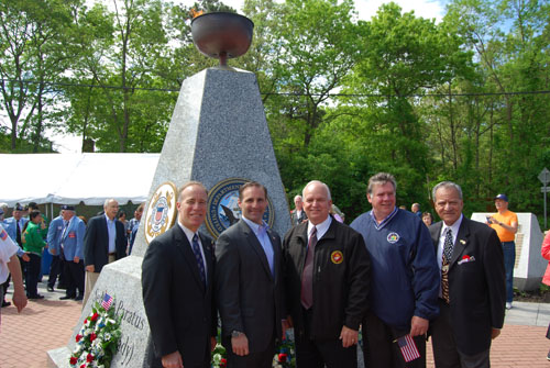 Mayor Allan M. Dorman (center), Village of Islandia, is joined by local elected officials at the village's Memorial Day ceremony at the Veteran's Memorial Triangle on May 24. Also pictured (left to right): Tom Cilmi, Suffolk County Legislator; Anthony Senft, Islip Town Councilman; Al Graf, New York State Assemblyman; and Tom Muratore, Suffolk County Legislator.