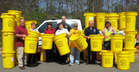 Pictured is Mayor Allan Dorman of the Village of Islandia along with employees who helped to distribute 1600 recycling pails to Village of Islandia residents.