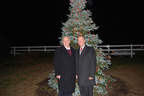 Islandia Village Mayor Allan M. Dorman (left) and Suffolk County Legislator Tom Cilmi (right), who joined Mayor Dorman in the lighting of the tree.