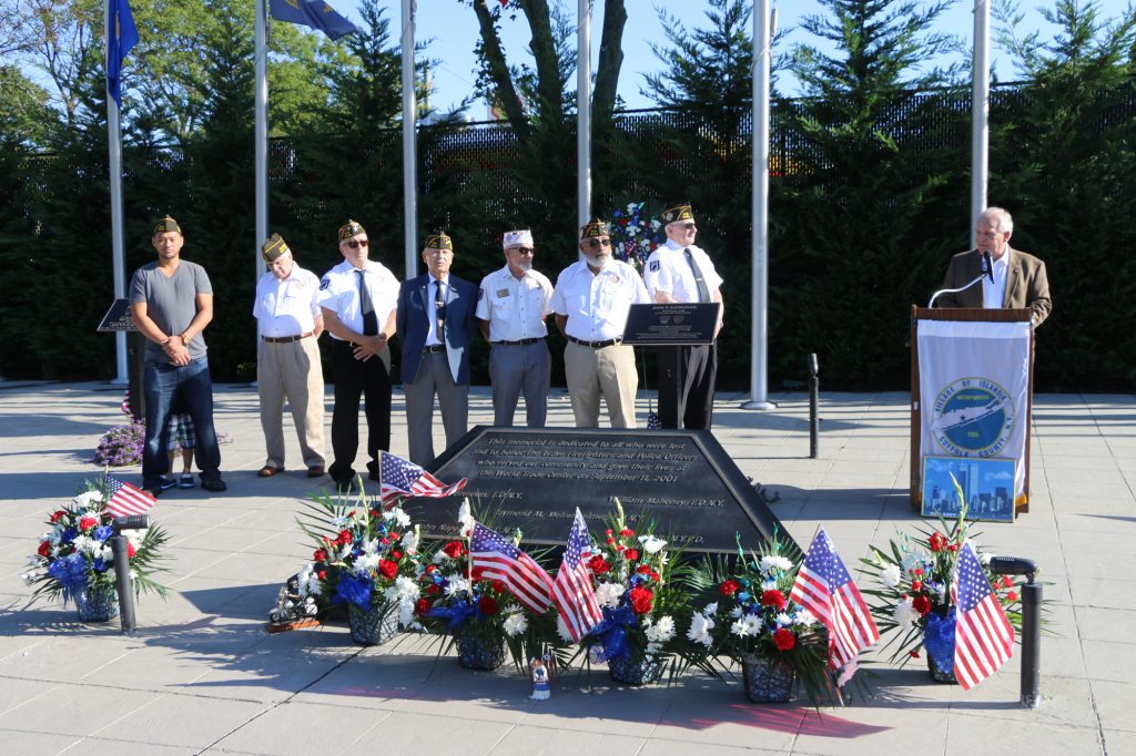 Mayor Dorman (standing behind podium) addresses those in attendance at the September 11th Memorial Ceremony at the First Responders Memorial on September 10.